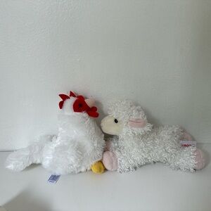 Aurora White and Yellow Plush Toys